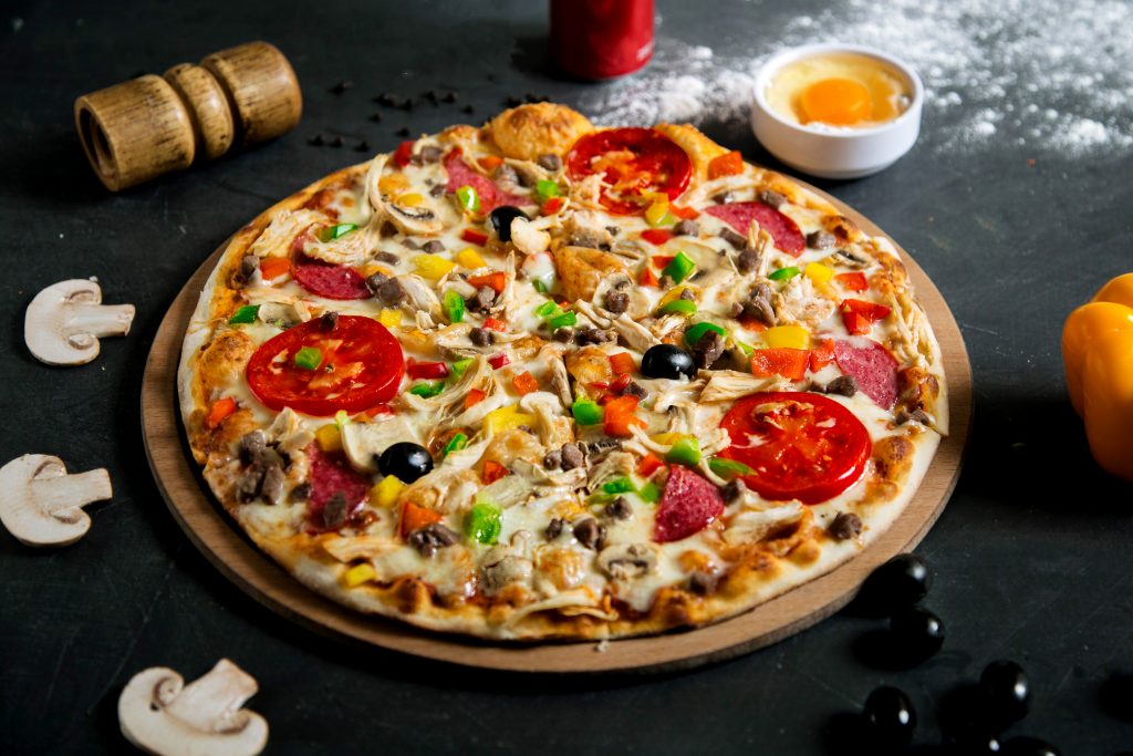 mixed pizza with various ingridients